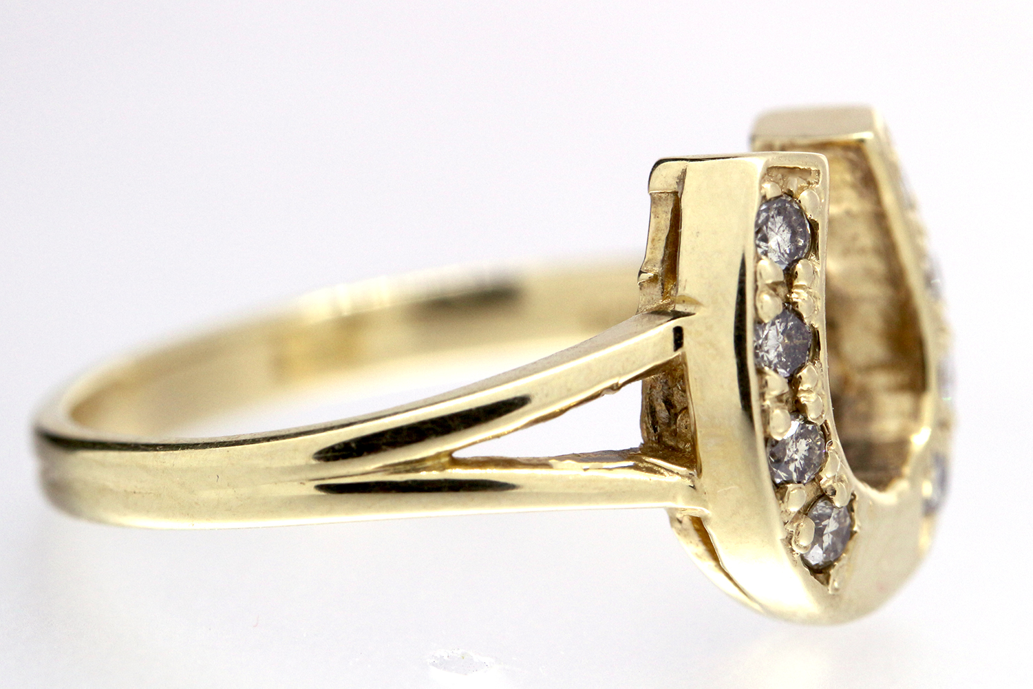 Equestrian Jewelry Diamond horseshoe split shank ring, set in 14K